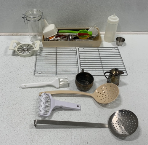 (1) UTENSIL STORAGE BIN, (1) LEMON/LIME SQUEEZER, (1) HAMILTON BEACH COOKING THERMOMETER, (1)SMALL METAL SPICE GRATER, (2) METAL COOKING RACKS AND MORE