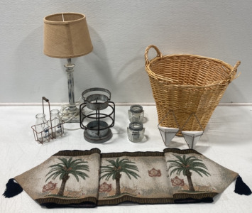 WICKER BASKET WITH TALL LAMP, METAL CANDLE HOLDER, SMALL GLASS CANDLE HOLDERS, CERAMIC TRIANGULAR WALL PLANT POTS, TABLE RUNNER AND MORE