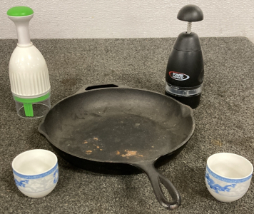 CAST-IRON PAN, 2 TEA CUPS, AND 2 SLAP CHOPS
