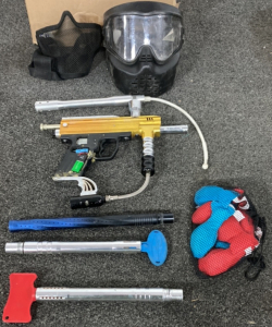 PAINT BALL GEAR INCLUDING GUN, FACE SHIELD, AND MORE