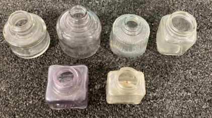 BOX OF SMALL GLASS BOTTLES