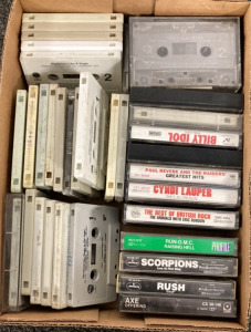 BOX OF CASSETTE TAPES INCLUDING BOB SEGER AND THE SILVER BULLET BAND, MADONNA, METAL KILLERS COLLECTION AND MORE