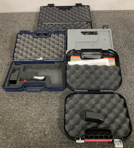 (4) HARD HANDGUN CASES WITH ACCESSORIES