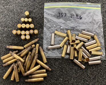 BAG OF MIXED SPENT BRASS AND STEEL SHELLCASES INCLUDING: .223/5.56, .357 MAG, 40 S&W, 380 AUTO, SIG 357 AND 10 MM
