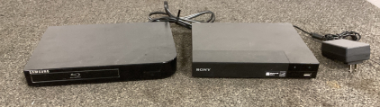 2 BLU-RAY PLAYERS (BOTH POWER ON) - NO REMOTES