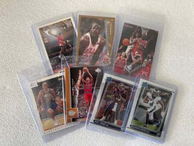 (7) SPORTS CARDS: MICHAEL JORDAN, GRANT HILL, MAC JONES AND DEVONTA SMITH