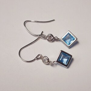 10K Blue Topaz And Moonstone Earrings