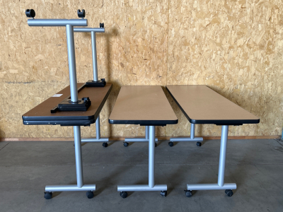 (4) ROLLING TABLES/ DESKS-59-1/2”x 19-1/2”x 29” (SOME TABLES MAY HAVE DAMAGED WHEELS)