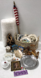 Woven Basket; “The Kiss” Statue; Assorted Knick- Knacks; (3)American Flags; Decorative Metal Drummer Plate; Conch Shell; Wind Up Musical Organ; Alaska Coaster Set; (4) Decorative Plates