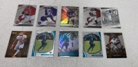 (10) 2021 NFL Cards Including Rookies And Prizms Such As Travis Etienne Jr, Trevon Moehrig And Others Such As Lamar Jackson, Patrick Mahomes And Tom Brady