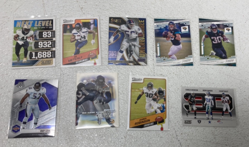 (9) 2000-2021 NFL Cards Including Players Such As Ray Lewis, DK Metcalf, James Robinson, Chris Carter And More