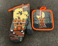 (1) HALLOWEEN THEMES OVEN MITT, (1) SET OF HALLOWEEN THEMED POT HOLDERS, (1) CERAMIC PUMPKIN CANDLE HOLDER, (2) CERAMIC FIGURINES, AND MORE - 2