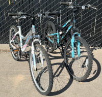 (2) TRAIL BIKES HUFFY AND HYPER ALUMINUM BIKES