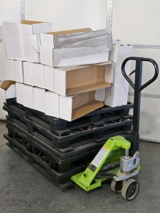 5500# PALLET JACK, PALLETS, (+/-30) 24x8.5x6 TRAY BOXES