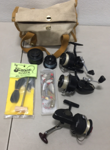 (2) Vintage Mitchell Spinning Fishing Reels (1)Vintage Dam Quick 220 Spinning Fishing Reel (1) Slinkie Maker Lure Maker Kit (1) Box of Lures (1) Soft Fishing Satchel
