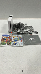 Wii W/ Power Cords, Games, And Manual
