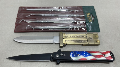 (1) U.S. Flag Switchblade Knife, (1) Brass Toned Scissor Action Paratroopers Knife W/ German Inscriptions On the Blade And Scales, (1) 4 Piece Hobby/Dental Pick Tool Kit