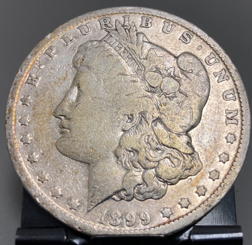 1899 MORGAN SILVER DOLLAR— VERIFIED AUTHENTIC