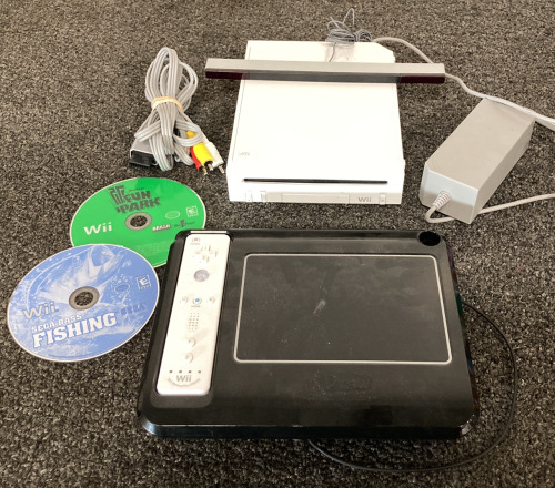 WII GAMING CONSOLE WITH GAMES AND ACCESSORIES— POWERS ON, NOT FULLY TESTED