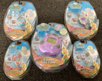 DISNEY PIXIE HOLLOW FACTORY SEALED GAME, BRACELETS AND CHARMS