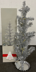 MARTHA HOLIDAY 30” PRE-LIT SILVER TINSEL TREE. REQUIRES BATTERIES.