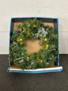 24” PRE-LIT WREATH- POWERS ON FOR THE MOST PART THE BIGGER BULBS DONT LIGHT UP.