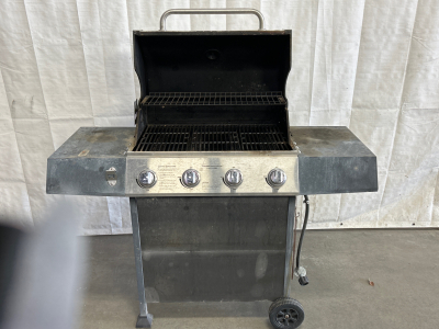 EXPERT GRILL PROPANE 4 BURNER GRILL WITH BOTTLENOPENER ATTACHED (NEEDS DEEP CLEANED)