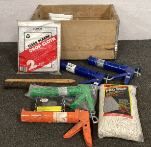 BOX OF TOOLSS INCLUDING (2) HEAVY DUTY 9’x12’ CLEAR PLASTIC DROP CLOTHS, GRIP RITE NAILS, (4) CAULKING GUNS, (1) COTTON MOP HEAD, AND MORE