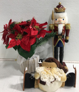 (1) 19&rdquo; Nutcracker Soldier (1 Arm Broken) (1) Light Up Poinsettia Plant (Turns On) (1) Stuffed Skiing Santa