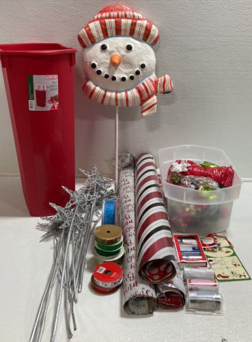 Wrapping Paper Storage Container, Snowman Yard Stake, Silver Glitter Star Sticks, Assorted Bows, Wrapping Paper, Gift Stickers and Ribbon