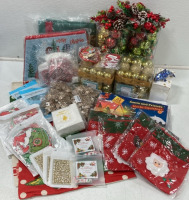 Assorted Ornaments; Gnome Tree Skirt; Christmas Tree Storage Bag; Holiday Nail Stickers; Grinch Ornament Kits; Christmas Gift Bags; Mochi Squishies Advent Calendar; Stockings Holders; Glittery Gold Poinsettias; Throw Pillow Covers and More!!