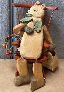 (1) MINI WOOD ROCKING CHAIR, (1) WOOD CARVED BEAR WITH WREATH AND WOOD HONEY COLLECTOR BAG