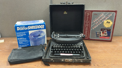 CARROLL’S TYPEWRITER MODEL 7 ( WORKS/ NO INK), DESKTOP SHREDDER, AND PHOTO ALBUM