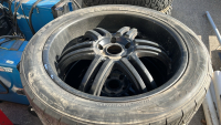 (2) NITTO TIRES AND (2) BRIMESTONE TRIES ( ALL SAME WHEEL) (2) SPARE TIRES - 3