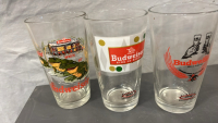 (3) BUDWISER CUPS AND (4) GLASS SHOT GLASSES - 3