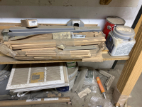 BOXES OF HARDWARE FOR MOUNTING DOORS INCLUDING LEVEL PASSAGES, HINGES, BRACKETS, PARTIAL & EMPTY 5 GALLON PAINT BUCKETS, 16”x16” AIR VENT COVERS, WOOD TRIM BOARDS AND 6’ LADDER (SHELVING NOT INCLUDED) - 6