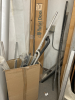 LARGE LOT WITH BOXES ANS BINS OF HARDWARE FOR DOORS INCLUDING HINGES, LATCHES, HANDLES, 2 WINDOW PANES WITH INTERNAL BLINDS ANS 1 SMALL/NARROW PANE (SHELVING NOT INCLUDED) - 4