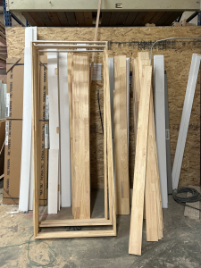 MEDIUM LOT OF DOOR TRIM AND FRAMES