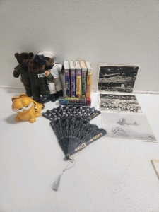 (3) vintage military plush bears (1) Ceramic Garfield vintage(5) vintage Disney vhs movies(1) cables disast truck(3)vintage pearl harbor aircraft pictures(2) decorative Asian wallfans