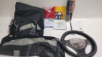 Large lot of flags (5) Table clothes (1) Steering wheel cover (1) Passenger or driver seat cover (1) Rear passenger seat cover