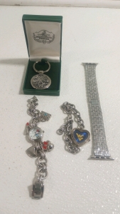 (1) Minnie Mouse Disney Charm Watch (1) West Virginia Watch (1) Mulligar Pewter Keychain (1) Bedazzled Watch Band