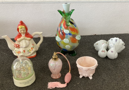 (1) LITTLE RED RIDING HOOD TEA POT, (1) CLOWN BODY VASE, (1) ANGEL SNOW GLOBE, (1) CERAMIC DOVE STATUE, (1) PERFUME