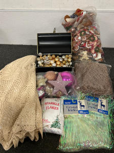 TOTE OF CHRISTMAS DECORATIONS, ORNAMENTS, TREE SKIRTS, AND MORE