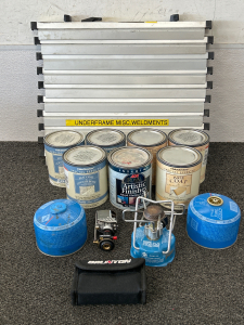 PARTIAL GLAZE PAINT QUARTS (7), ALUMINUM BLUEPRINT HANGERS, PNEUMATIC DA SANDER AND SMALL SINGLE BURNER CAMP STOVE WITH GAS (2-7 3/4 OUNCES)