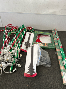GREEN & RED OUTDOOR CANDYCANE LIGHTS WITH TARD STAKES (WORKS), 16&rdquo; LIGHTED SANTA (WORKS), METAL WREATH DOOR HANGERS (2) AND WRAPPING PAPER (2 ROLLS-1 IS PARTIAL)