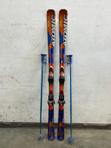 PAIR OF ATOMIC SX=7 SKIS AND POLES
