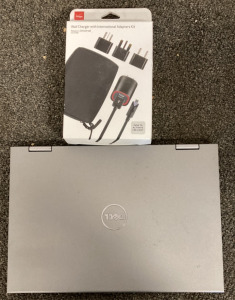 ONE DELL INSPIRON LAPTOP (NO CORDS), ONE VERIZON WALL CHARGER WITH INTERNATIONAL ADAPTERS KIT