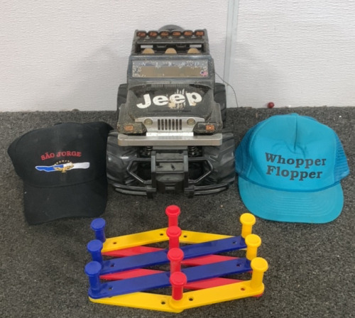 (1) ELECTRIC POWERED TOY JEEP (UNABLE TO TEST), (2) BASEBALL CAP HATS, (1) EXPANDABLE PLASTIC TOY