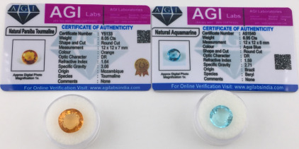 (2) Certified Natural Gemstone W/COA&rsquo;s Including (1) 8.05ct Orange Paraiba Tourmaline (1) 6.95ct. Round Cut Aquamarine