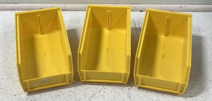 THREE YELLOW STACKABLE ULINE ORGANIZER BOXES